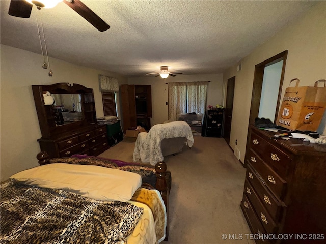 50 Fairway, Burneyville, OK 73430 - bedroom featuring carpet floors, a textured ceiling, and ceiling fan