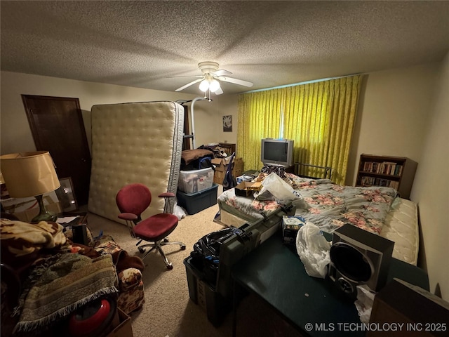 50 Fairway, Burneyville, OK 73430 - carpeted bedroom featuring a textured ceiling and ceiling fan