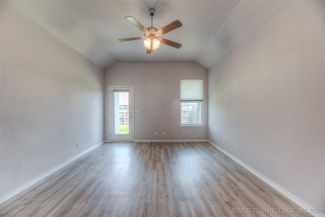 25363 E 87th St S, Broken Arrow, OK 74014 - empty room featuring wood finished floors, a ceiling fan, baseboards, and vaulted ceiling