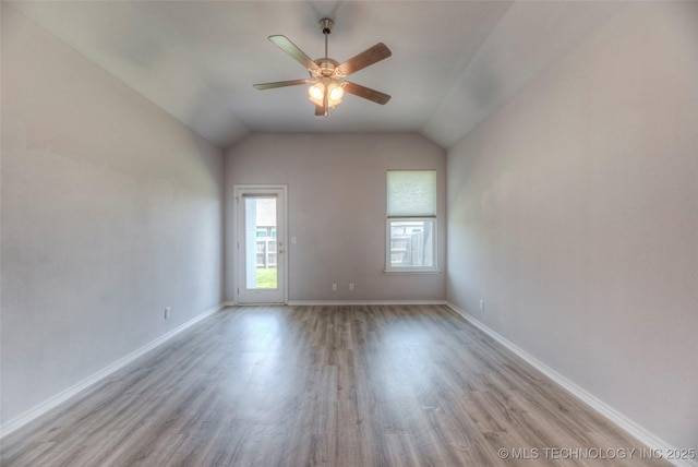 25363 E 87th St S, Broken Arrow, OK 74014 - spare room with wood finished floors, a ceiling fan, baseboards, and lofted ceiling