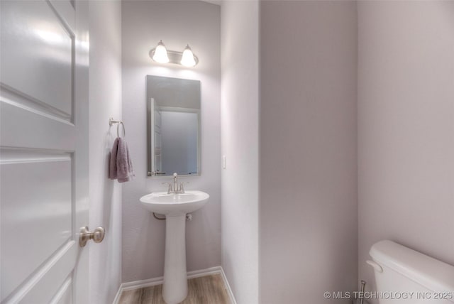 25363 E 87th St S, Broken Arrow, OK 74014 - half bath featuring toilet, wood finished floors, and baseboards