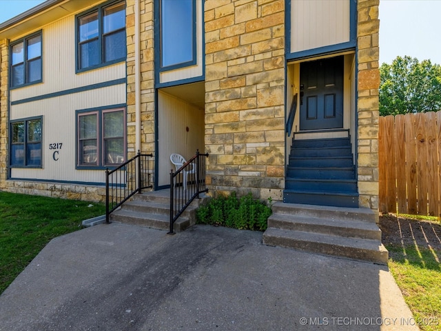 5217 Nowata Rd Unit C204, Bartlesville, OK 74006 - entrance to property featuring stone siding
