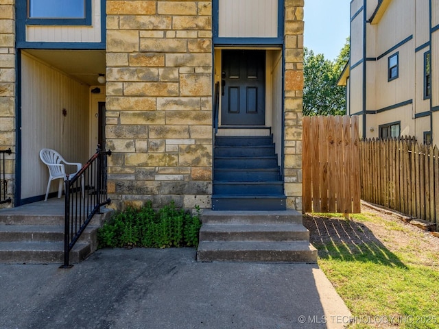 5217 Nowata Rd Unit C204, Bartlesville, OK 74006 - doorway to property with stone siding