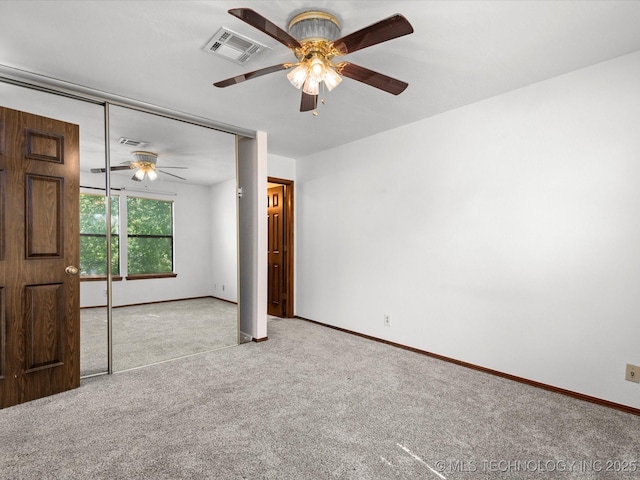 5217 Nowata Rd Unit C204, Bartlesville, OK 74006 - carpeted empty room with ceiling fan and baseboards