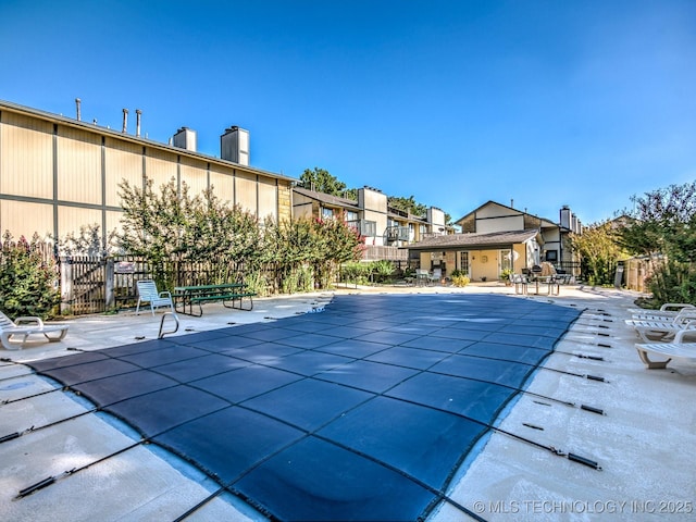 5217 Nowata Rd Unit C204, Bartlesville, OK 74006 - community pool featuring a patio area