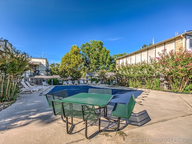 5217 Nowata Rd Unit C204, Bartlesville, OK 74006 - view of swimming pool with a patio