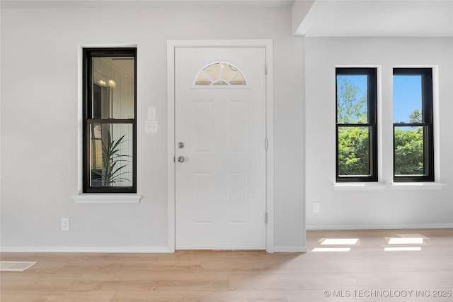 1602 N Hickory Ave, Broken Arrow, OK 74012 - foyer featuring baseboards and light wood-style flooring