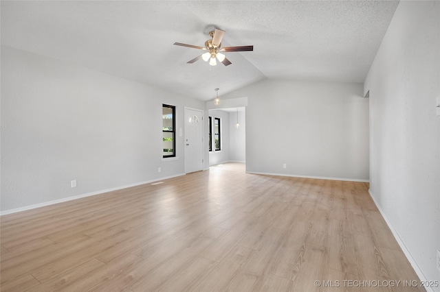 1602 N Hickory Ave, Broken Arrow, OK 74012 - empty room featuring ceiling fan, light wood-style flooring, vaulted ceiling, and baseboards