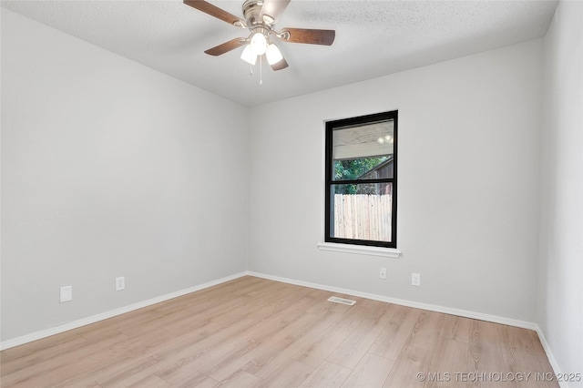 1602 N Hickory Ave, Broken Arrow, OK 74012 - empty room featuring wood finished floors, baseboards, and ceiling fan
