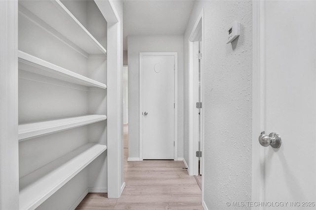 1602 N Hickory Ave, Broken Arrow, OK 74012 - hall featuring wood finished floors and baseboards