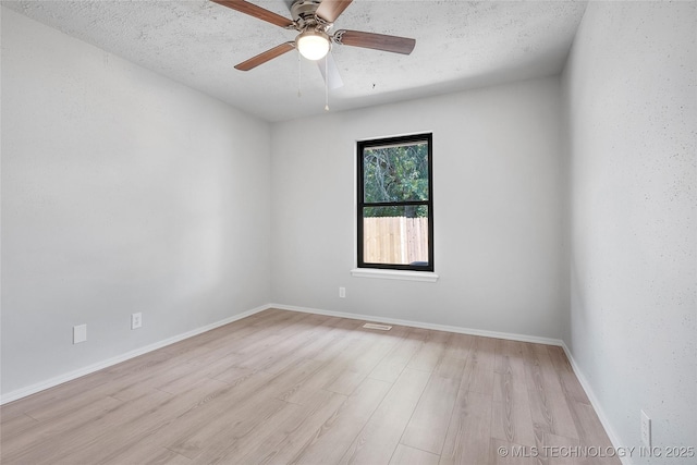 1602 N Hickory Ave, Broken Arrow, OK 74012 - empty room featuring light wood-style flooring, ceiling fan, baseboards, and a textured ceiling