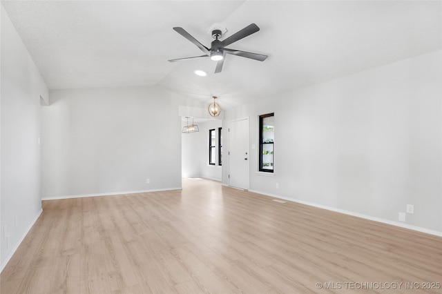 1602 N Hickory Ave, Broken Arrow, OK 74012 - unfurnished living room featuring light wood-type flooring, ceiling fan, a chandelier, and lofted ceiling
