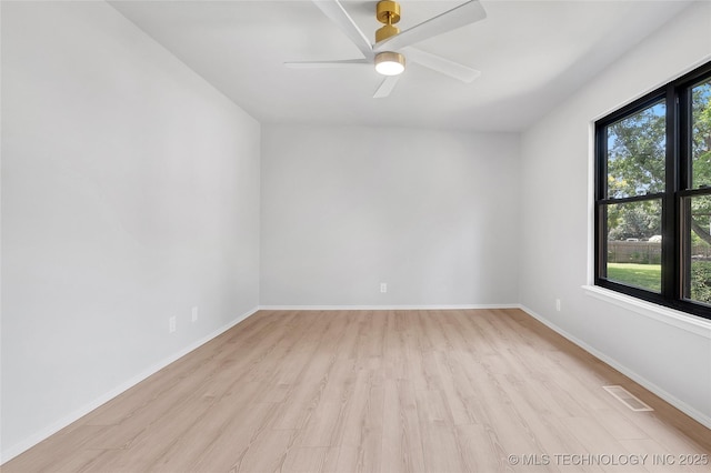 1602 N Hickory Ave, Broken Arrow, OK 74012 - empty room featuring light wood-style floors, baseboards, and ceiling fan