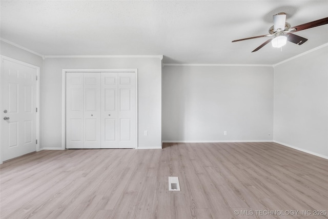 1602 N Hickory Ave, Broken Arrow, OK 74012 - unfurnished bedroom featuring light wood finished floors, crown molding, a closet, ceiling fan, and baseboards