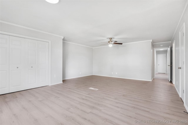 1602 N Hickory Ave, Broken Arrow, OK 74012 - unfurnished bedroom with light wood finished floors, baseboards, crown molding, and a closet