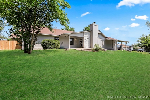 1602 N Hickory Ave, Broken Arrow, OK 74012 - back of property featuring a chimney and stone siding