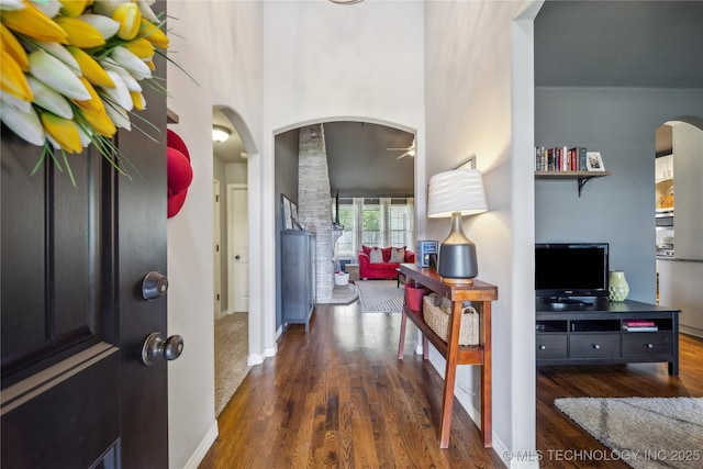 18409 E 50th Pl S, Tulsa, OK 74134 - entrance foyer with ceiling fan, wood finished floors, arched walkways, a towering ceiling, and baseboards