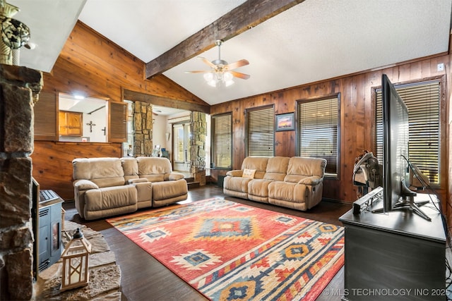20700 E 420th Rd, Claremore, OK 74017 - living room with wooden walls, ceiling fan, wood finished floors, and a wood stove