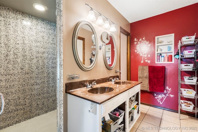 20700 E 420th Rd, Claremore, OK 74017 - bathroom with double vanity, tile patterned floors, and a tile shower