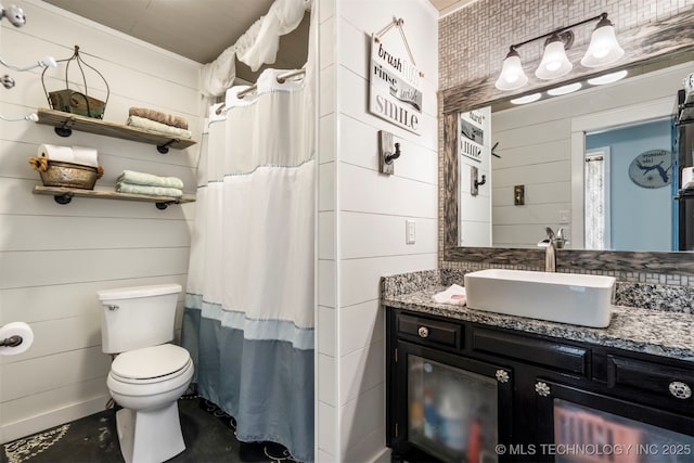 20700 E 420th Rd, Claremore, OK 74017 - full bathroom featuring vanity, wood walls, and curtained shower