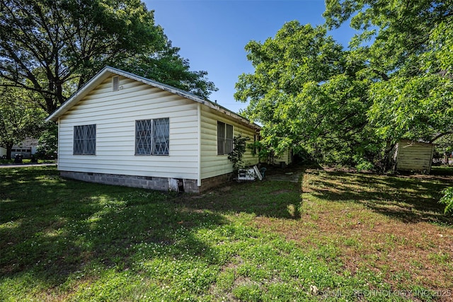 506 S 8th, Davis, OK 73030 - view of side of property featuring a lawn and crawl space