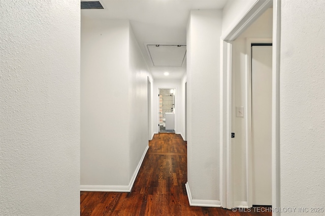 1206 S Osage Ave, Bartlesville, OK 74003 - hall featuring attic access, wood finished floors, and baseboards