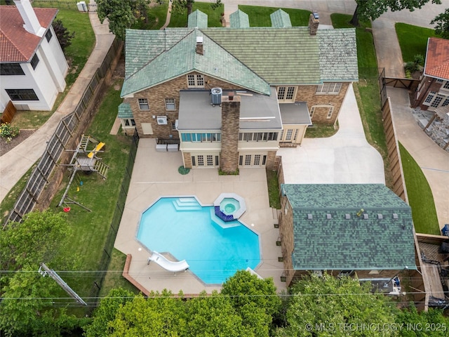 1217 Hazel Blvd, Tulsa, OK 74114 - aerial view of property and surrounding area featuring a pool area