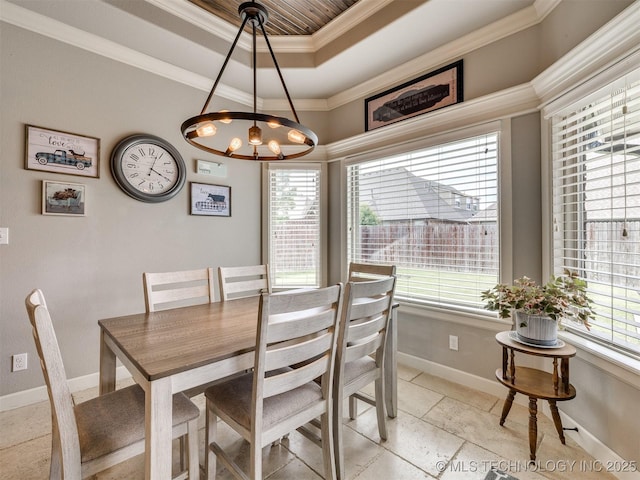 7605 E 82nd Pl, Owasso, OK 74055 - dining room featuring a raised ceiling, crown molding, healthy amount of natural light, a chandelier, and baseboards