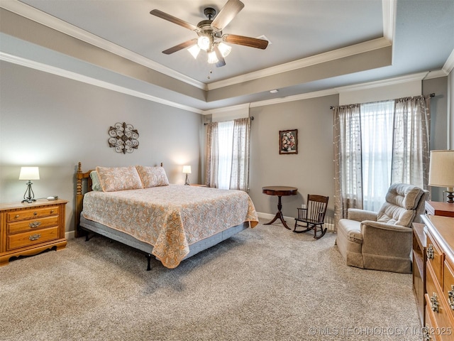 7605 E 82nd Pl, Owasso, OK 74055 - bedroom featuring a raised ceiling, light colored carpet, ornamental molding, a ceiling fan, and baseboards