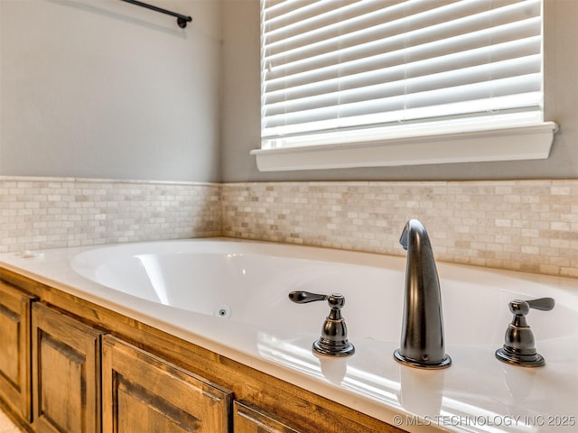 7605 E 82nd Pl, Owasso, OK 74055 - bathroom featuring a whirlpool tub