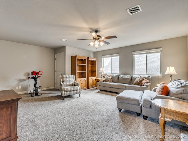 7605 E 82nd Pl, Owasso, OK 74055 - living room featuring carpet flooring, ceiling fan, and baseboards