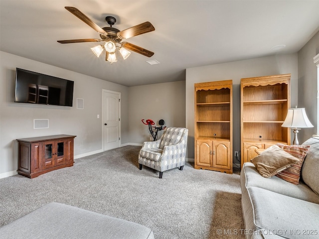 7605 E 82nd Pl, Owasso, OK 74055 - carpeted living area with ceiling fan and baseboards