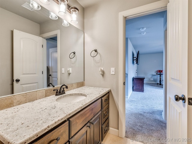 7605 E 82nd Pl, Owasso, OK 74055 - bathroom featuring vanity and baseboards