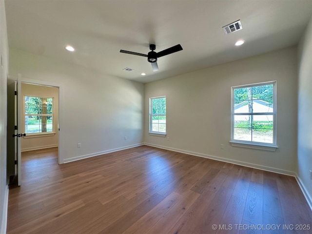 12443 Longboard Loop, Kingston, OK 73439 - unfurnished room featuring a ceiling fan, dark wood finished floors, baseboards, and recessed lighting