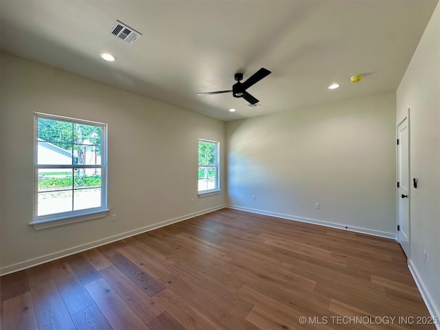 12443 Longboard Loop, Kingston, OK 73439 - empty room with a ceiling fan, wood finished floors, baseboards, and recessed lighting