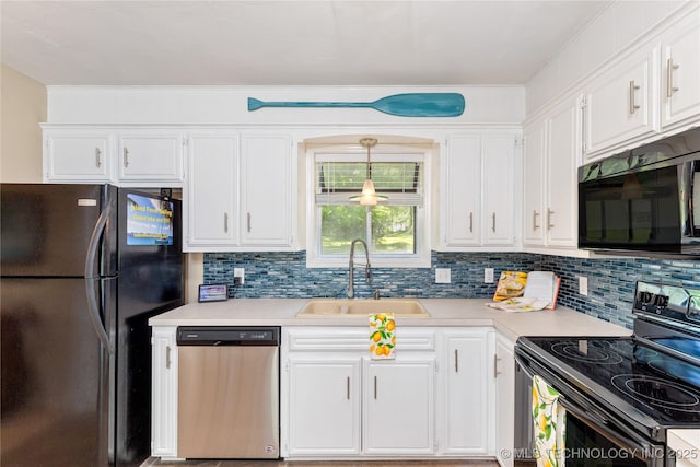32075 Felts Ln, Afton, OK 74331 - kitchen with black appliances, a sink, light countertops, white cabinetry, and decorative backsplash