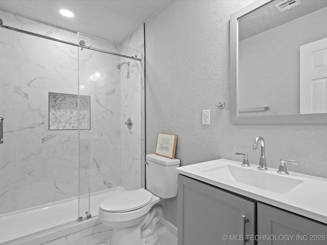10931 E 4th Pl, Tulsa, OK 74128 - full bath with marble finish floors, toilet, vanity, a marble finish shower, and a textured wall