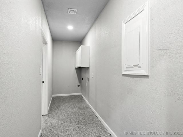 10931 E 4th Pl, Tulsa, OK 74128 - laundry area with baseboards, carpet flooring, and a textured wall