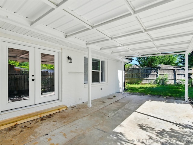 10931 E 4th Pl, Tulsa, OK 74128 - view of patio / terrace with french doors