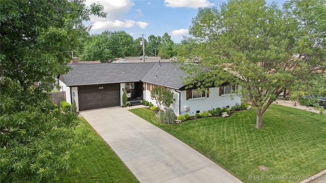 4341 E 56th Pl, Tulsa, OK 74135 - view of front of house with a shingled roof, driveway, and a garage