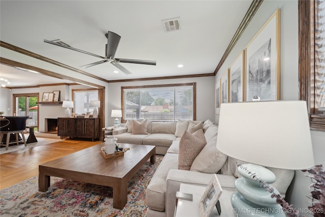 4341 E 56th Pl, Tulsa, OK 74135 - living area featuring crown molding, a ceiling fan, and recessed lighting