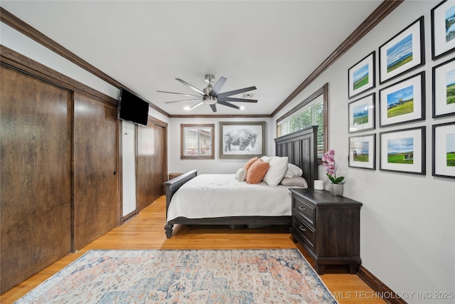 4341 E 56th Pl, Tulsa, OK 74135 - bedroom with ornamental molding, light wood-style flooring, and ceiling fan