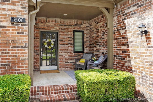 5506 E 110th Pl, Tulsa, OK 74137 - view of exterior entry with brick siding