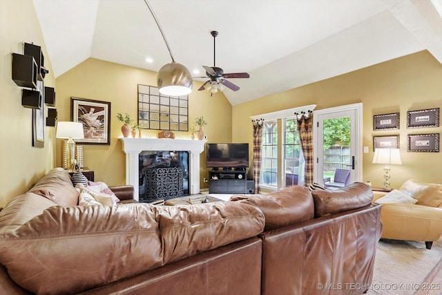 5506 E 110th Pl, Tulsa, OK 74137 - living area featuring vaulted ceiling, a ceiling fan, and a premium fireplace