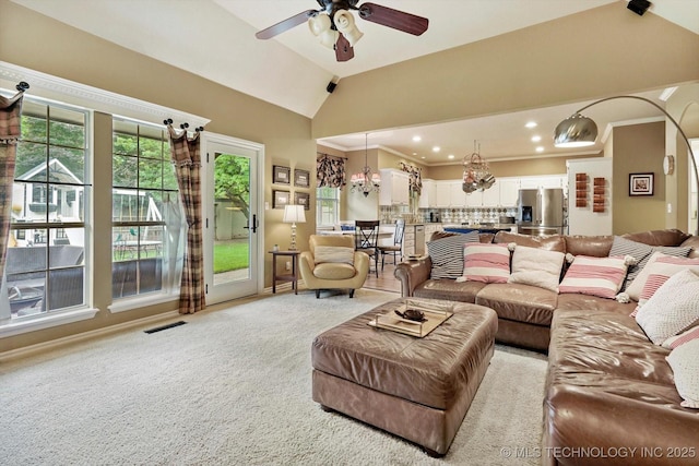 5506 E 110th Pl, Tulsa, OK 74137 - living room with lofted ceiling, a ceiling fan, light carpet, and recessed lighting