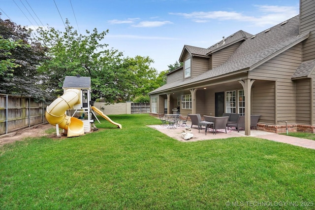 5506 E 110th Pl, Tulsa, OK 74137 - view of yard with a patio area and a playground
