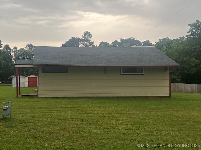 101 N 3rd St, Hartshorne, OK 74547 - view of side of home featuring an outdoor structure