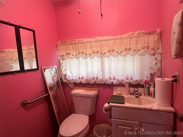 101 N 3rd St, Hartshorne, OK 74547 - bathroom with vanity and toilet