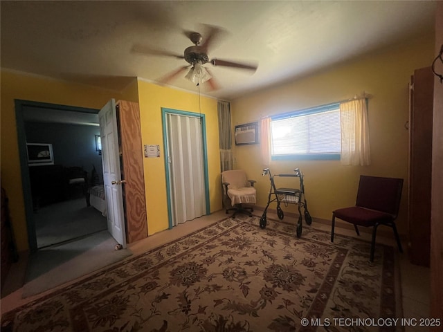 101 N 3rd St, Hartshorne, OK 74547 - sitting room with ceiling fan and a wall unit AC