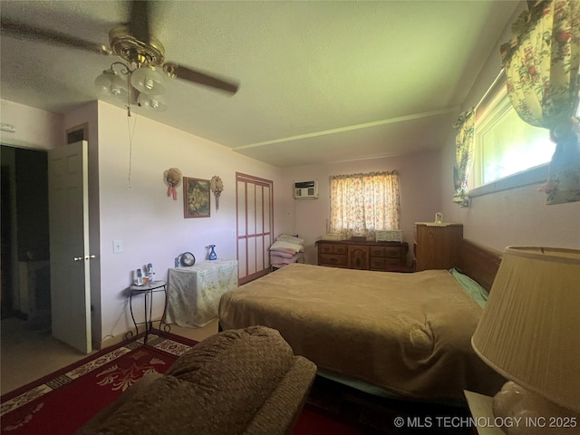101 N 3rd St, Hartshorne, OK 74547 - bedroom with ceiling fan and an AC wall unit